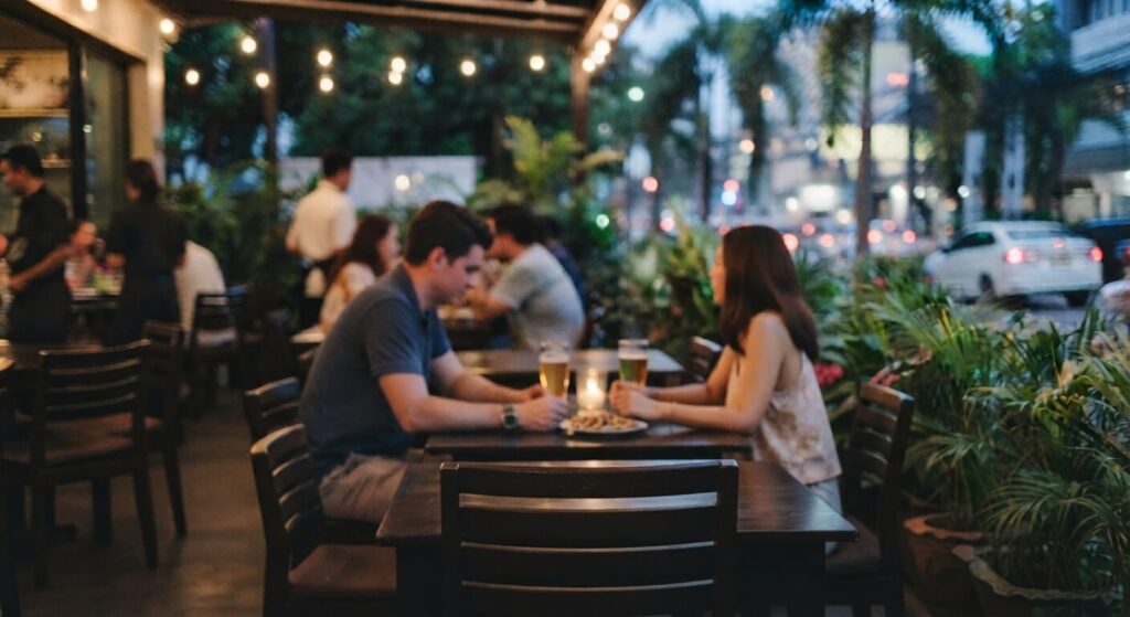 A young man and woman having casual drinks at a restaurant in Davao City.